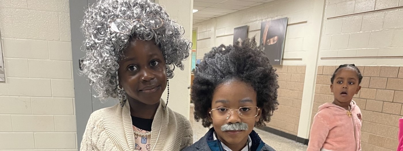 Two pre-k students dressed as elderly people for the 100th day of school